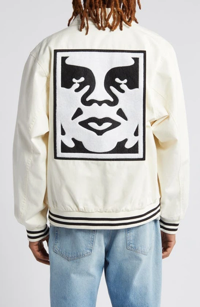 Shop Obey Icon Face Varsity Jacket In Unbleached