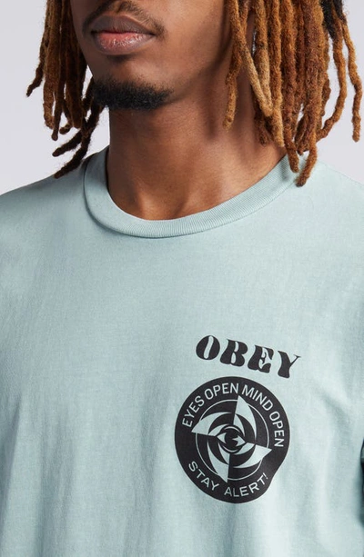 Shop Obey Stay Alert Graphic T-shirt In Pigment Surf Spray