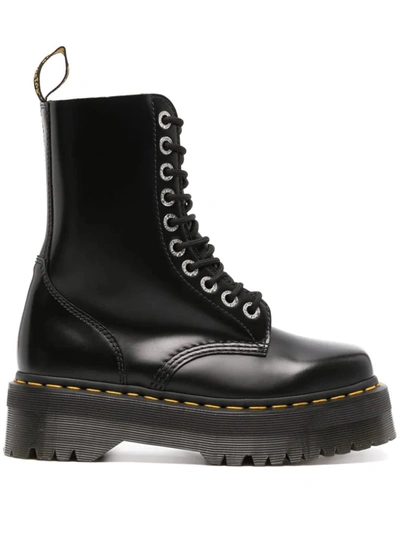 Dr. Martens' Platform Boots With Treaded Sole And Distinctive Accents In Black
