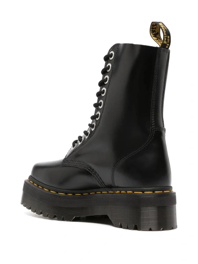 Dr. Martens' Platform Boots With Treaded Sole And Distinctive Accents In Black