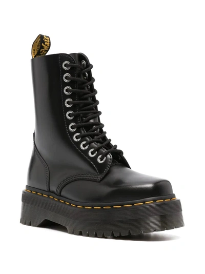 Dr. Martens' Platform Boots With Treaded Sole And Distinctive Accents In Black