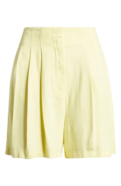Shop Asos Design Seamed Waist Shorts In Yellow