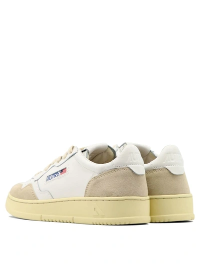 Shop Autry Sneakers In White