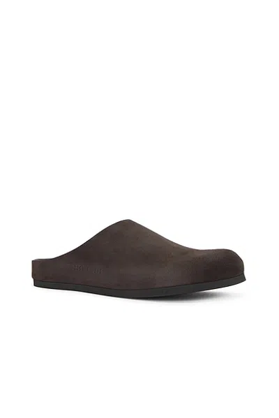 Common Projects Logo-debossed Suede Clogs In Black