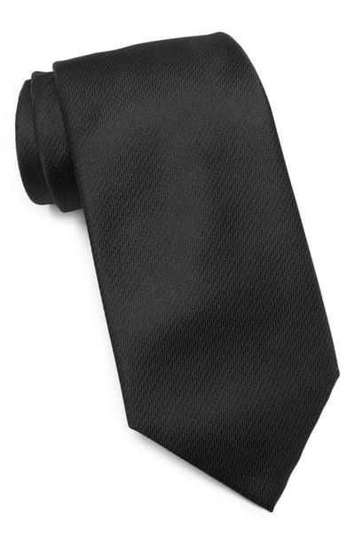 Shop Tommy Hilfiger Micro Texture Solid Tie In Black