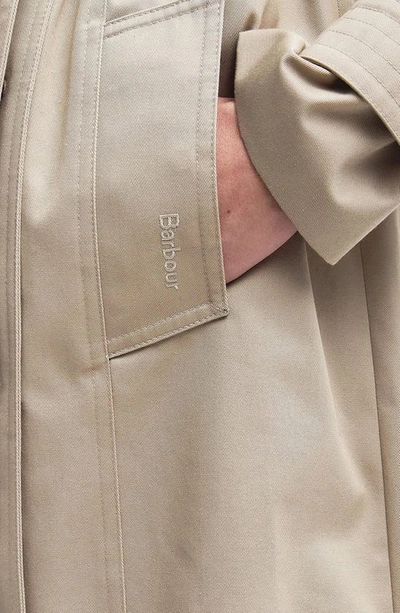 Shop Barbour Greta Showerproof Belted Trench Coat In Light Fawn/ Primrose Hessian