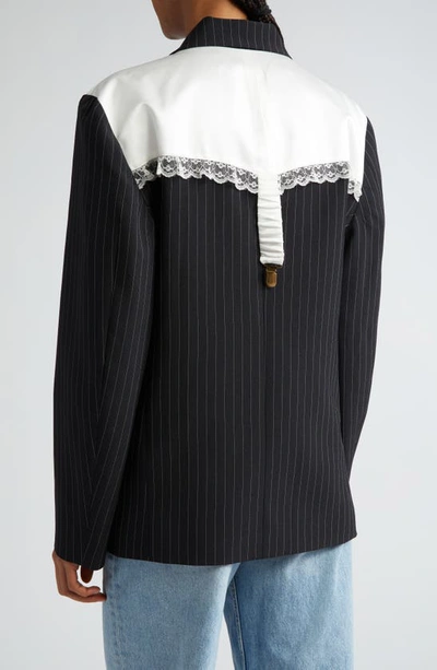 Shop Tanner Fletcher Gender Inclusive Gussie Pinstripe Garter Detail Wool Blend Blazer In Black Pinstripe