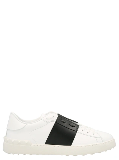 Shop Valentino Rockstud Sneakers In White/black