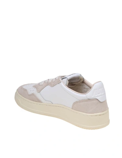 Shop Autry Leather And Suede Sneakers In White / Sand