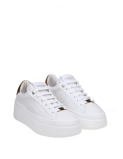 Shop Ferragamo Leather Sneakers In White