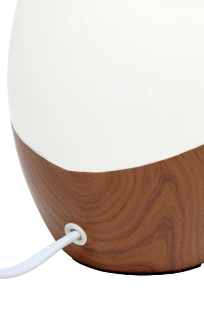 Shop Lalia Home Strikers Table Lamp In Off White/ Dark Wood
