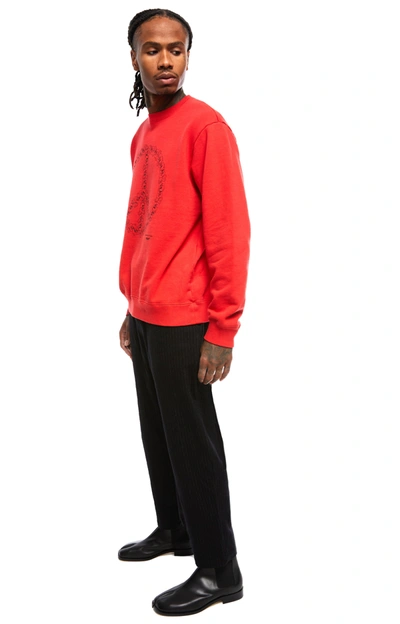 Shop Undercover Peace Sign Sweatshirt In Red