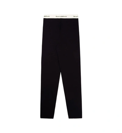 Shop Sporty And Rich Serif Logo Ribbed Legging In Black