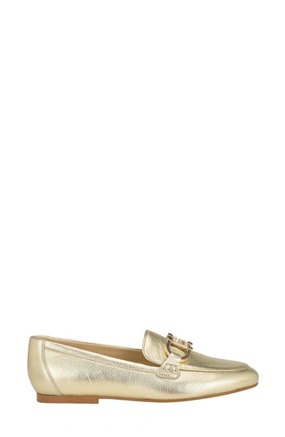 Shop Guess Isaac Bit Loafer In Gold