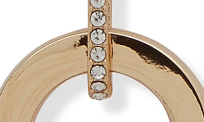 Shop Dkny Pavé Crystal Oval Link Long Pendant Necklace In Gold/ Crystal