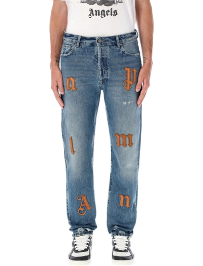 Shop Palm Angels Lw Logo Patches Denim Jeans In Blue