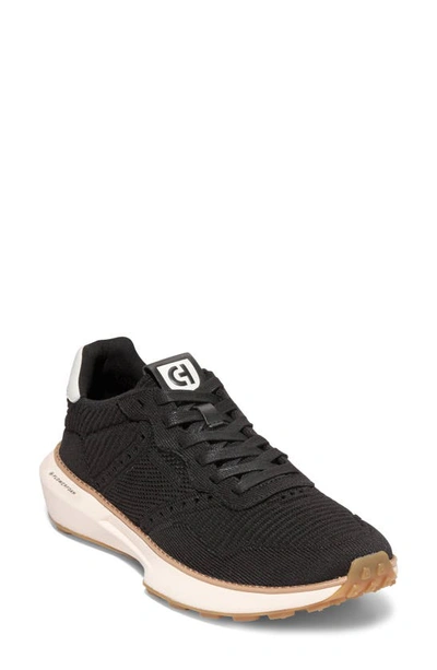 Shop Cole Haan Grandpro Ashland Stitchlite™ Sneaker In Black/ Tornado/ Ivory