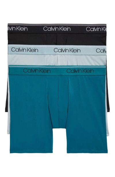 Shop Calvin Klein 3-pack Low Rise Microfiber Stretch Boxer Briefs In Black/ Arona/ Teal
