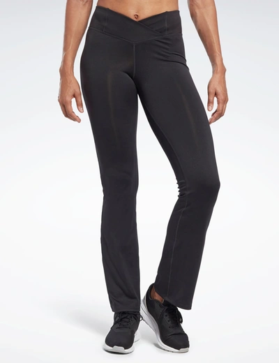 Shop Reebok Workout Ready Pant Program Bootcut Pants In Black