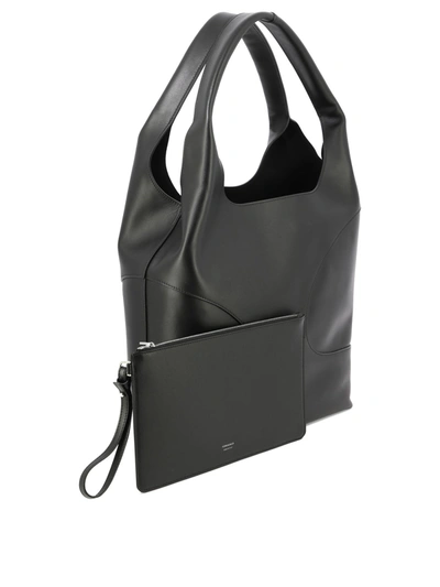 Shop Ferragamo Hobo Bag With Cut-out Detailing In Black