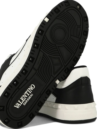 Shop Valentino Garavani Low Top Sneaker "freedots" In Black