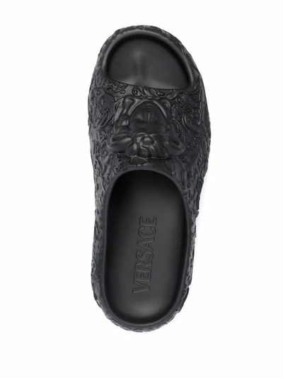 Shop Versace Sandals In Black