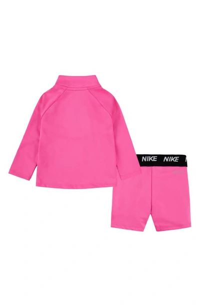 Shop Nike Dri-fit Half Zip Jacket & Bike Shorts Set In Pink Glow