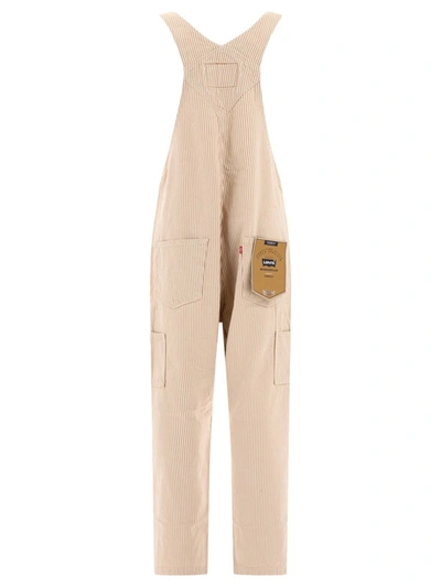 Shop Levi's "® Red Tab™" Overalls In Beige