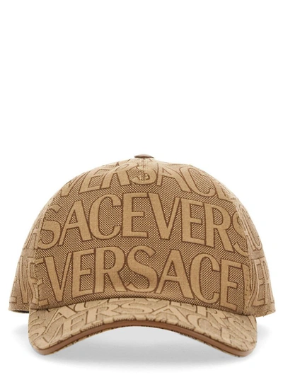 Shop Versace Baseball Cap In Beige