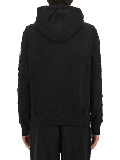 Versace Jeans Couture Full-zip Hoodie With Adjustable Drawstrings And Subtle Branding In Black