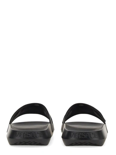 Shop Versace Slide Sandal In Black
