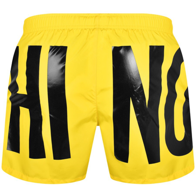 Shop Moschino Logo Swim Shorts Yellow