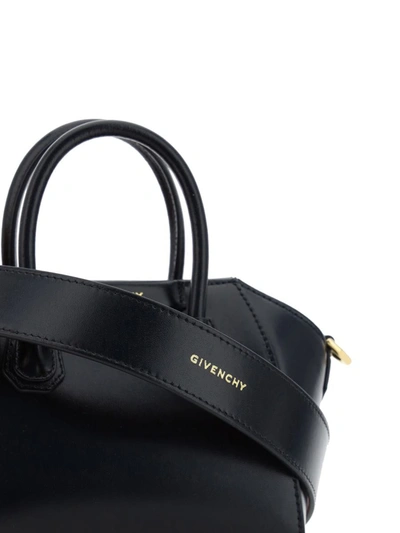 Shop Givenchy Handbags In Black/red
