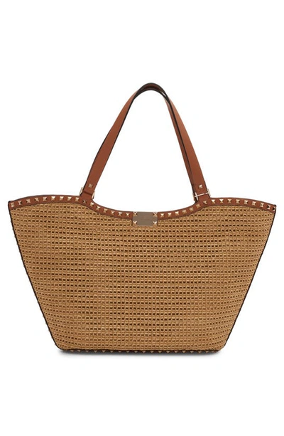 Shop Valentino Rockstud Raffia Tote In Yhn Naturale/ Almond Beige