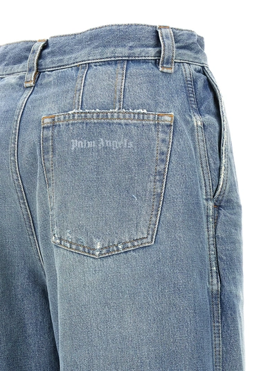 Shop Palm Angels Washed Logo Jeans Light Blue