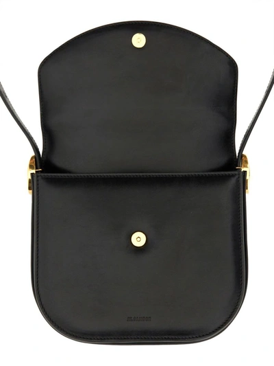 Shop Jil Sander Coin Shoulder Bag In Black