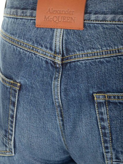 Shop Alexander Mcqueen Cuffed Hems Jeans In Blue