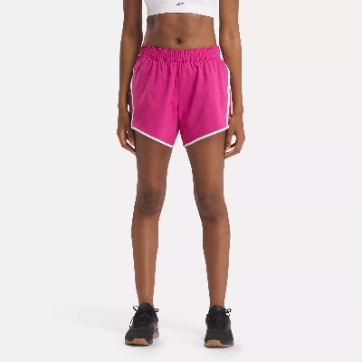 Shop Reebok Women's Id Train Woven Shorts In Pink