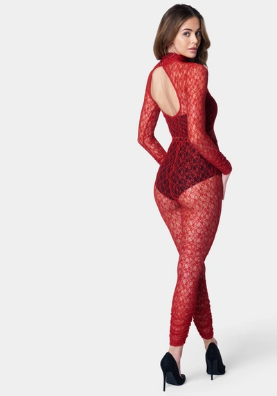 Shop Bebe Open Back Turtle Neck Lace Catsuit In Salsa