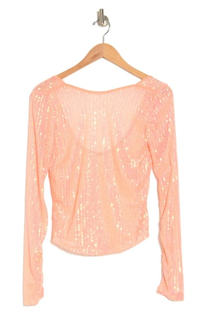 Shop Free People Unapologetic Sequin Long Sleeve Top In Peach