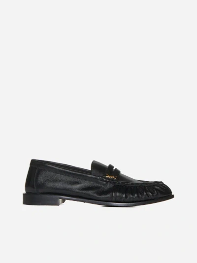 Shop Saint Laurent Ysl Logo Leather Loafers In Black
