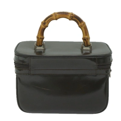 Shop Gucci Brown Patent Leather Clutch Bag ()