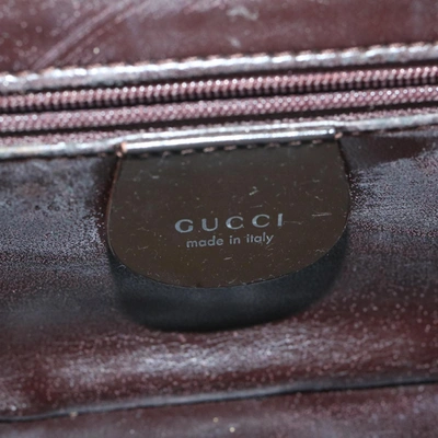 Shop Gucci Brown Patent Leather Clutch Bag ()