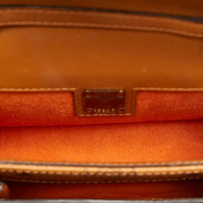Shop Mcm Visetos Brown Leather Clutch Bag ()