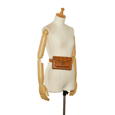 Shop Mcm Visetos Brown Leather Clutch Bag ()