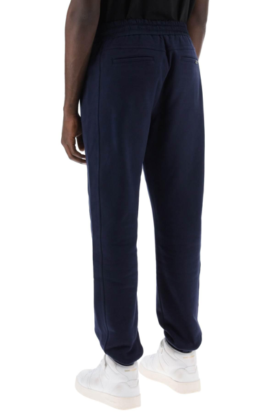 Shop Saint Laurent Satin-finished Joggers With In Blue