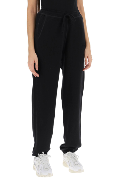 Shop Ganni Joggers In Cotton French Terry In Black (black)