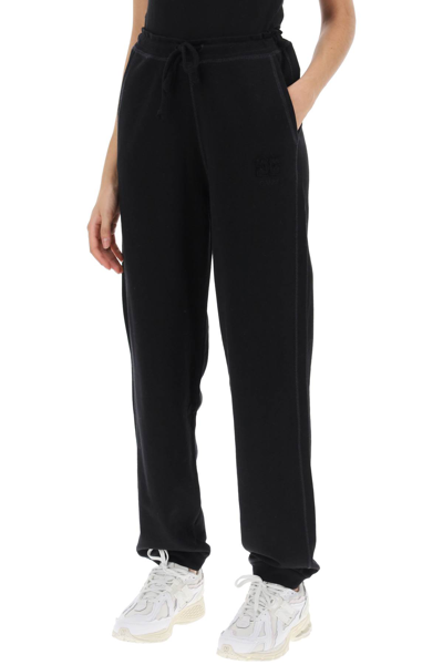Shop Ganni Joggers In Cotton French Terry In Black (black)