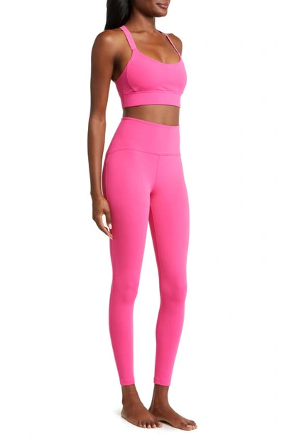 Shop Beyond Yoga Powerbeyond™ Strive High Waisted Midi Leggings In Pink Energy