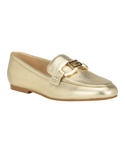 Shop Guess Women's Isaac Slip On Flat Loafers With Hardware In Gold Leather